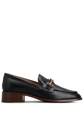 Tod's logo-plaque leather loafers - Black
