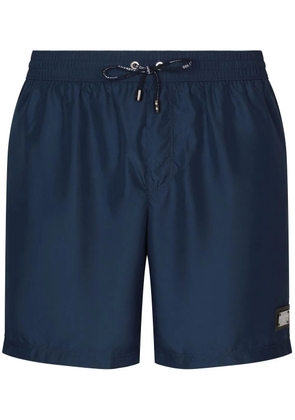Dolce & Gabbana logo-tag long-leg swim shorts - Blue