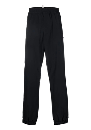 Moncler Grenoble logo-print straight-leg trousers - Black