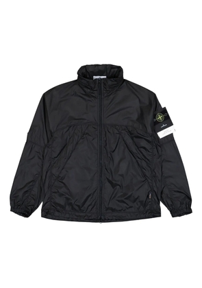 Stone Island concealed-hood zip-up windbreaker - Grey