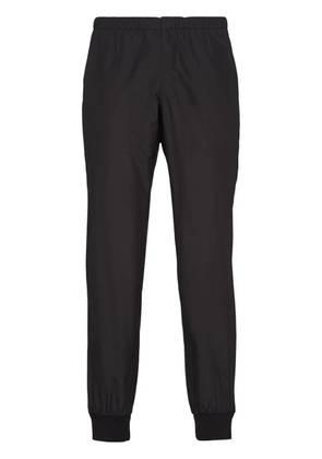 Prada triangle-logo silk-blend track pants - Black