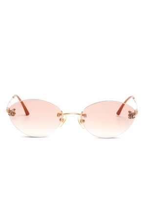CHANEL Pre-Owned 2000s round rimless sunglasses - Pink
