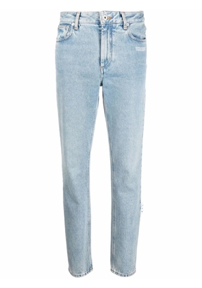 Off-White logo-patch denim jeans - Blue