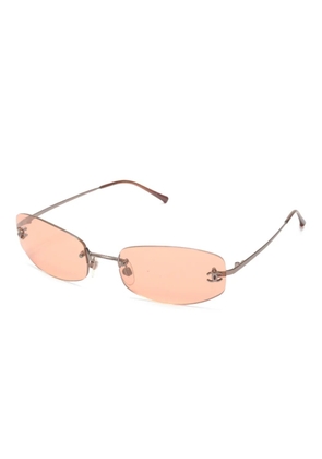 CHANEL Pre-Owned 2000s rimless logo sunglasses - Pink