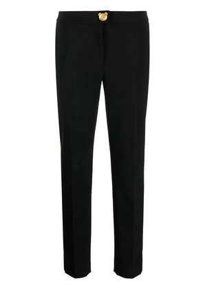 Moschino tapered side-stripe trousers - Black