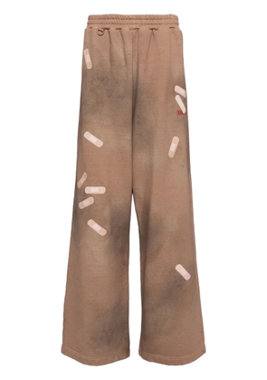 Doublet tape-embroidered track pants - Brown