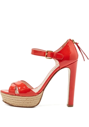 Miu Miu Pre-Owned platform cross-strap heeled sandals - Red