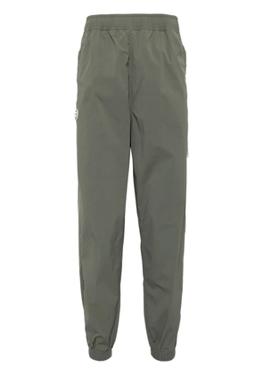 AAPE BY *A BATHING APE® logo-patch pants - Green