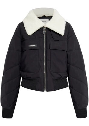 Coperni logo-patch faux-shearling puffer jacket - Black