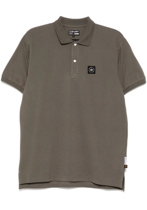 izzue logo-patch polo shirt - Green