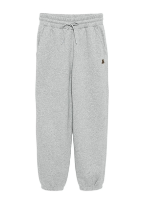 izzue bear-embroidered trousers - Grey