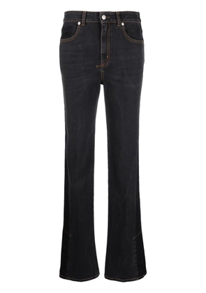 Alexander McQueen logo-patch bootcut jeans - Black