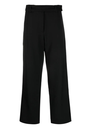 Studio Nicholson virgin wool wide-leg trousers - Black