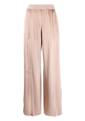 Stine Goya Ciara logo-waistband satin trousers - Pink