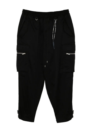 Mastermind World graphic-embroidered trousers - Black