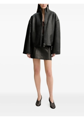 AERON button-fastening leather mini skirt - Black