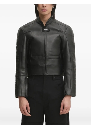 VETEMENTS logo-embossed leather jacket - Black