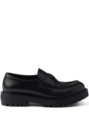 Prada enamelled-triangle logo leather loafers - Black