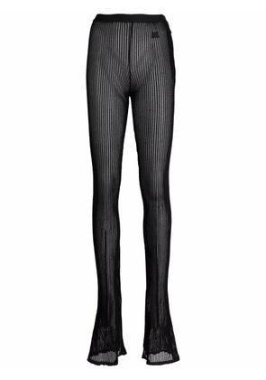 Courrèges sheer embroidered-logo trousers - Black
