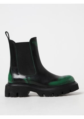Msgm ankle boots in used effect leather