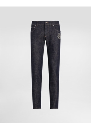 Dolce & Gabbana Skinny Stretch Cotton Jeans With Patch - Man Denim Multi-colored 56