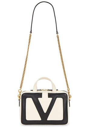 Valentino Garavani Viva Superstar Small Duffle Bag in Butter White & Nero - White. Size all.