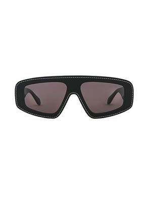ALAÏA Shield Sunglasses in Black & Grey - Black. Size all.