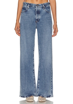 FRAME The Loose Jeans in Rundown - Blue. Size 26 (also in 29).