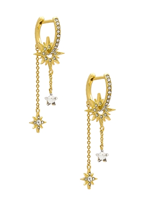 BaubleBar Star Huggie Drop Earrings in Metallic Gold.