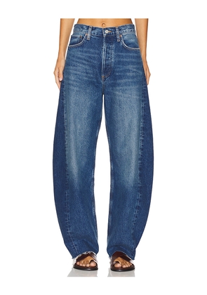 AGOLDE Luna Pieced High Rise Curved Taper Jeans in Denim-Medium. Size 23. Also in 24, 25, 26, 27, 28, 29, 30.