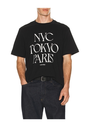 Calvin Klein Flagship City Tee in Black. Size L. Also in M, S, XL/1X.