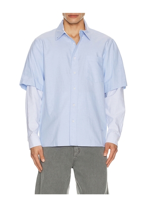 SIMKHAI Quade Double Sleeve Shirt in Baby Blue. Size M. Also in L, S, XL/1X, XXL/2X.