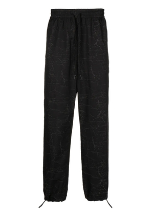 Ports V all-over logo print trousers - Black