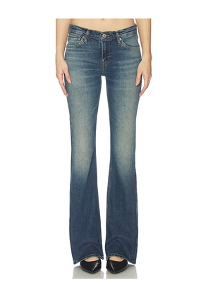 RE/DONE Low Rise Micro Boot Jeans in Blue. Size 24. Also in 25, 28, 29, 30.