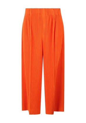 Homme Plissé Issey Miyake MC February trousers - Orange