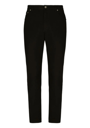 Dolce & Gabbana logo-appliqué tapered-leg jeans - Black