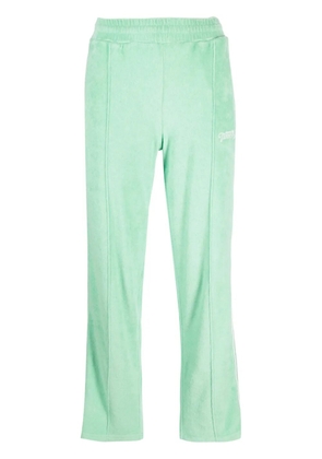 Sporty & Rich New Serif logo-embroidered track pants - Green
