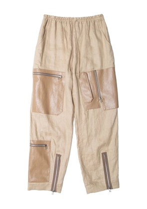 Muller Of Yoshiokubo leather-panel zip-detail trousers - Neutrals