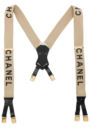 CHANEL Pre-Owned logo print suspenders - Neutrals