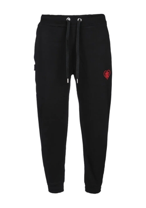 Family First heart-embroidered track pants - Black