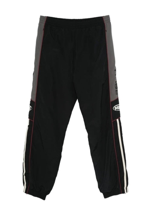 Martine Rose side-stripe track pants - Black