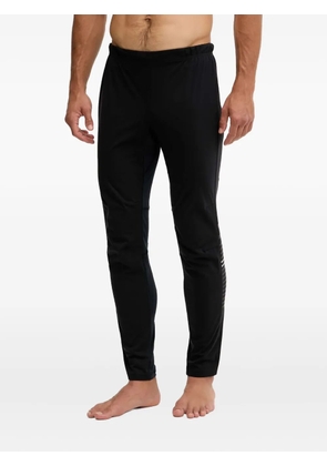 Rossignol Poursuite logo-stripe trousers - Black