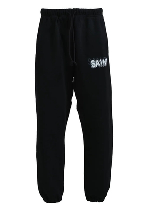 SAINT MXXXXXX logo-print track pants - Black
