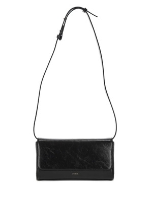 STAND OIL Butter adjustable-strap clutch bag - Black