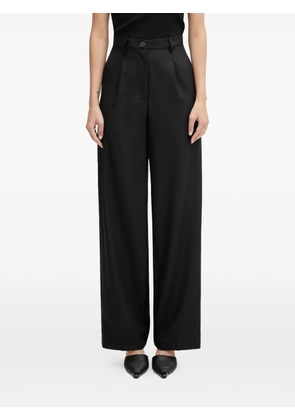 Fiorucci button pleated trousers - Black