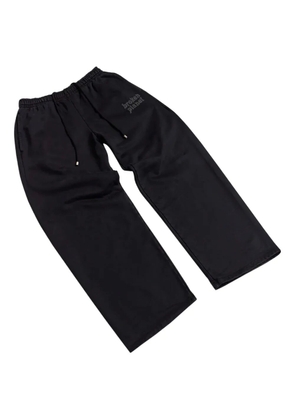 BROKEN PLANET Star logo track pants - Black