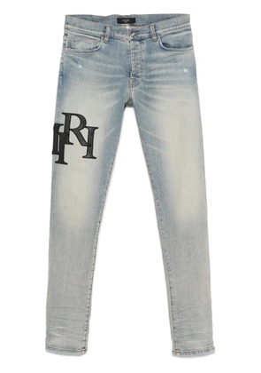 AMIRI Staggered-logo jeans - Blue
