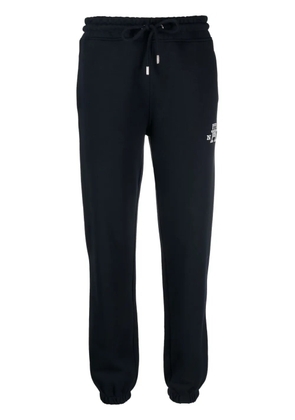 Tommy Hilfiger monogram-embroidered cotton track pants - Blue