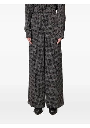 Kenzo geometric-pattern trousers - Black