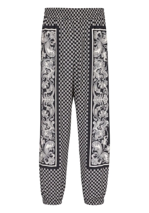Balmain monigram-print elasticated-waistband track pants - Black